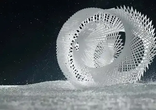 Complex 3D printed lattice sphere on a powder bed