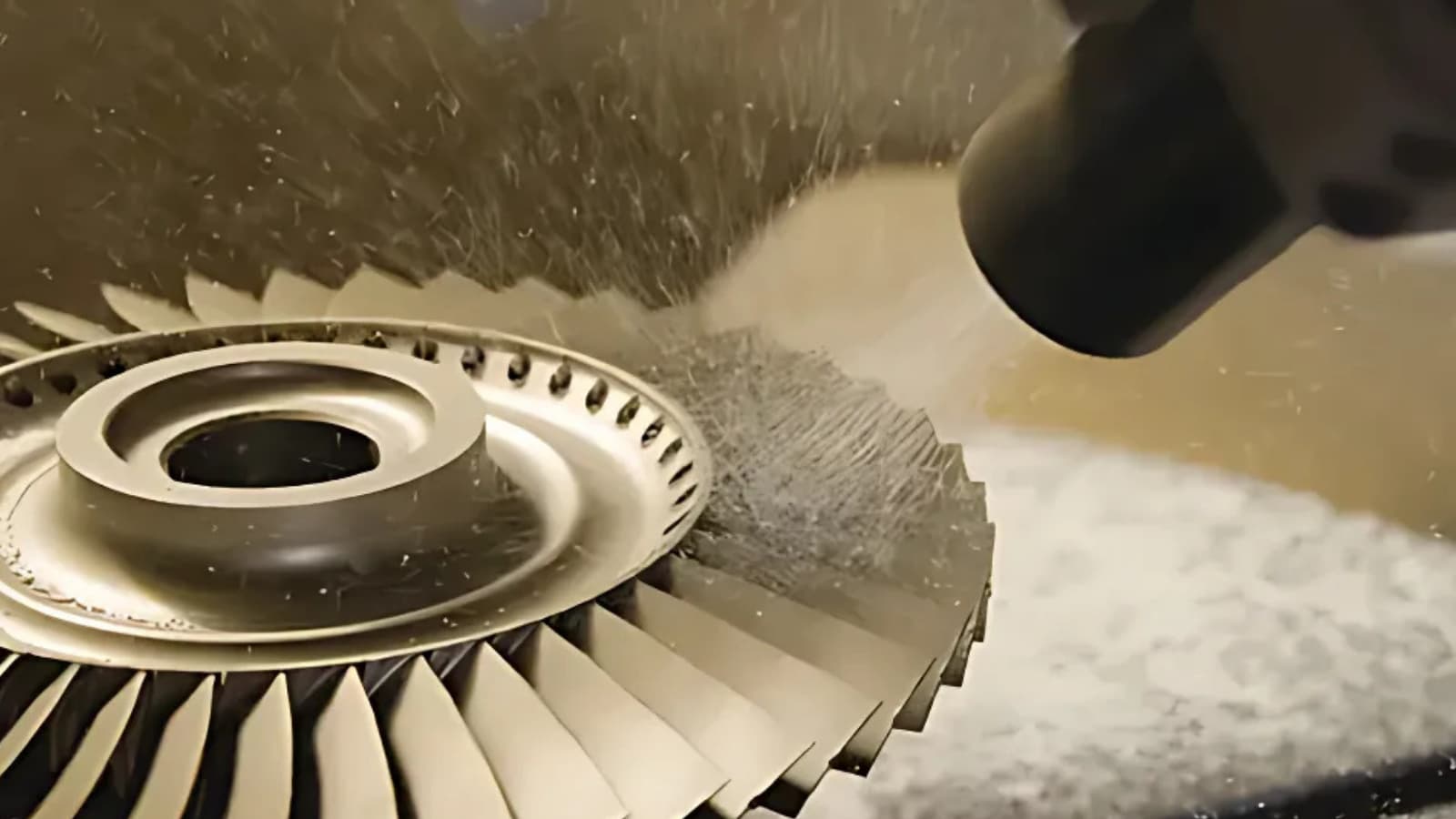 an part being blasted