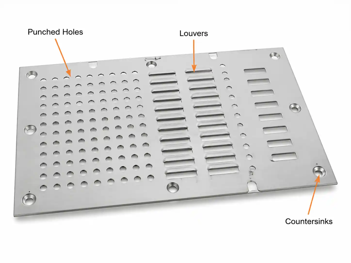CNC turret-punched aluminum panel showing formed metal features: round punched holes in a grid, raised louvers, and countersunk holes with tapered edges