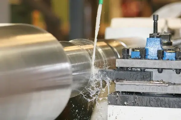 A Cnc Turning Machine Is Turning A Bar Stock