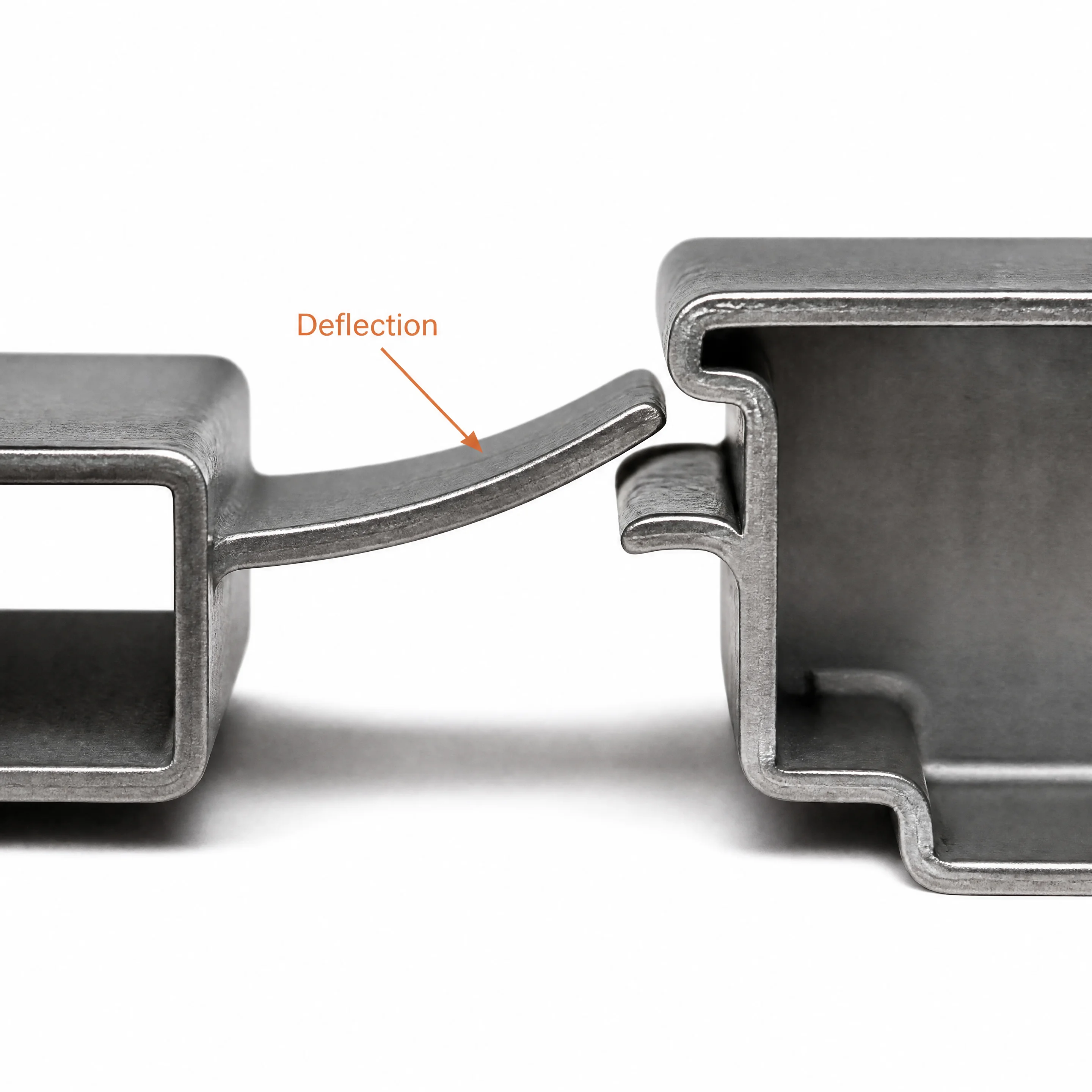 Snap-fit cantilever tab deflecting mid-engagement before locking into mating edge