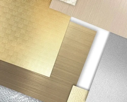 Anodized aluminum sheet samples in gold, bronze and natural