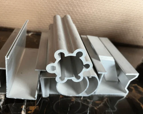 Custom aluminum extrusion profiles stacked after production